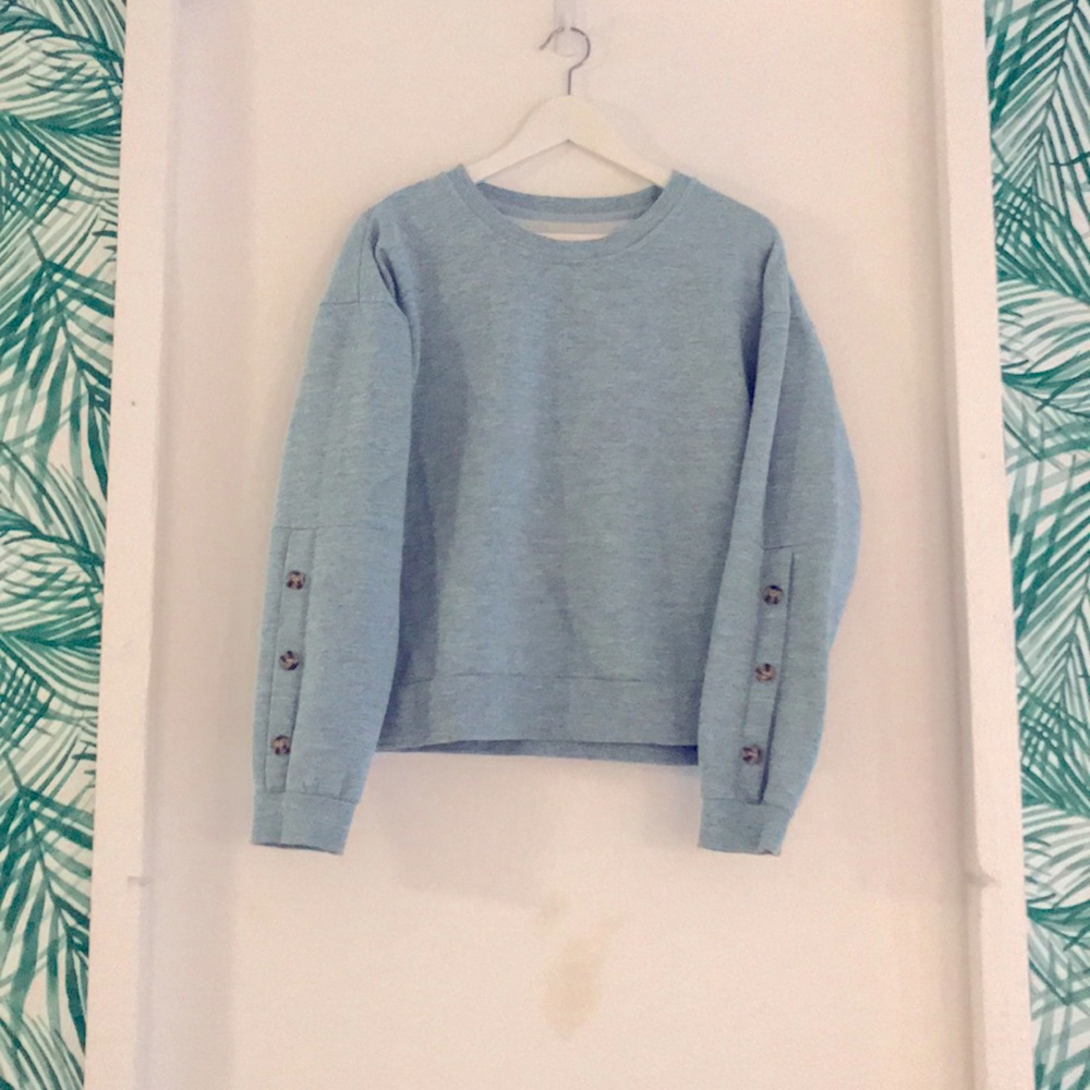 Reflex sweatshirt with button sleeves